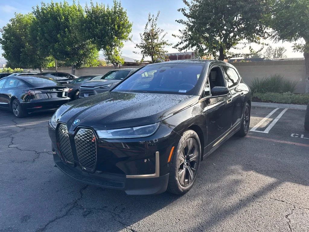 Used 2023 Black BMW xDrive50 image 1