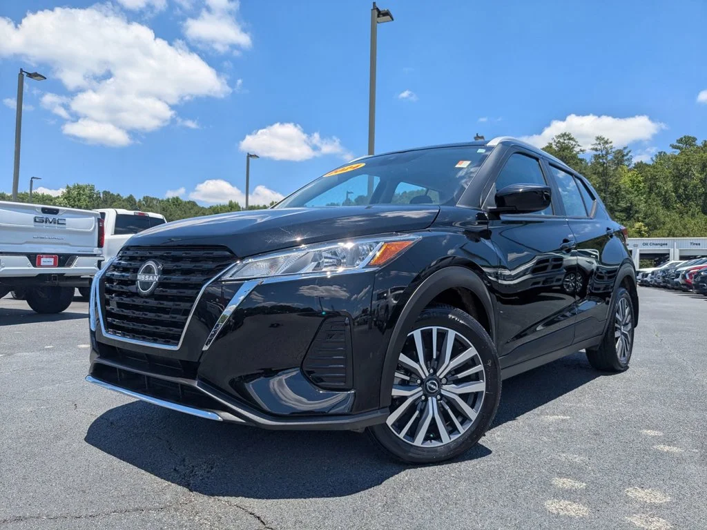 Used 2024 Super Black Nissan SV image 1