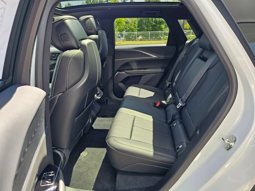 New 2026 Vibrant White Tricoat Cadillac Sport image 16