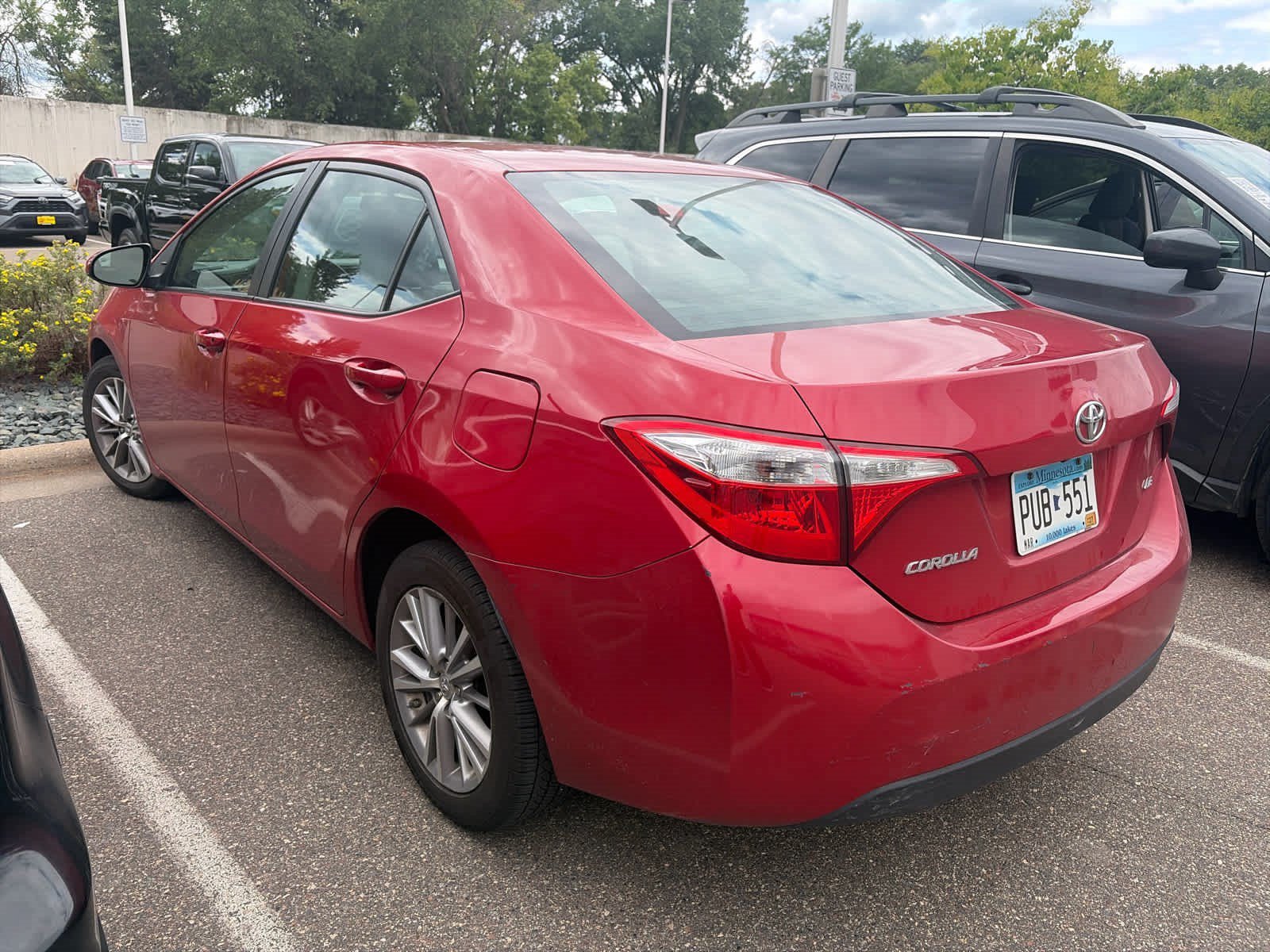 Used 2015 Barcelona Red Metallic Toyota LE Plus image 3