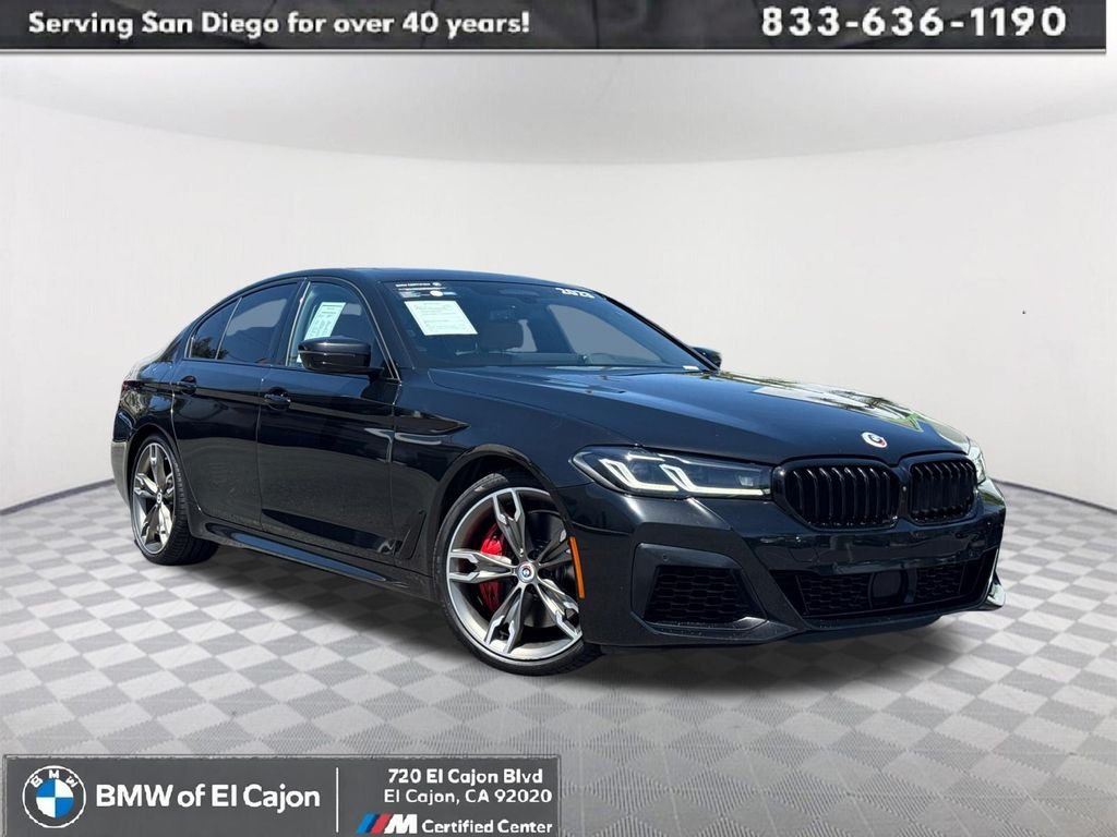 Used 2023 Black BMW M550i xDrive image 1