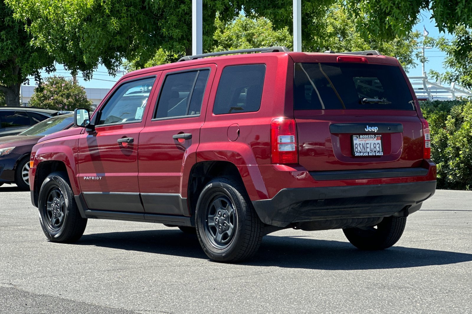 Used 2016 Deep Cherry Red Crystal Pearlcoat Jeep Sport image 6