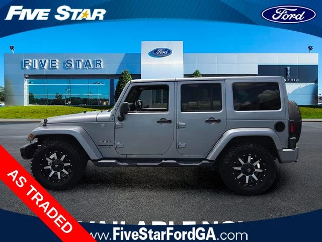 Used 2016 Silver Jeep Unlimited Sahara image 4