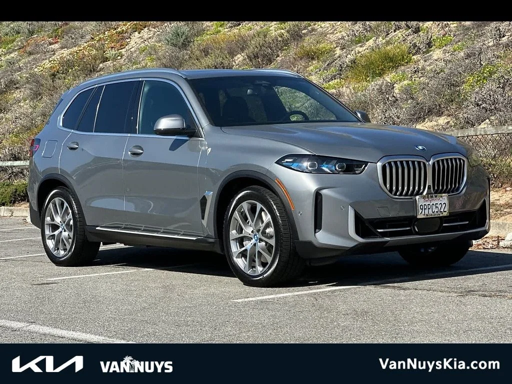 Used 2025 Gray BMW xDrive50e image 1