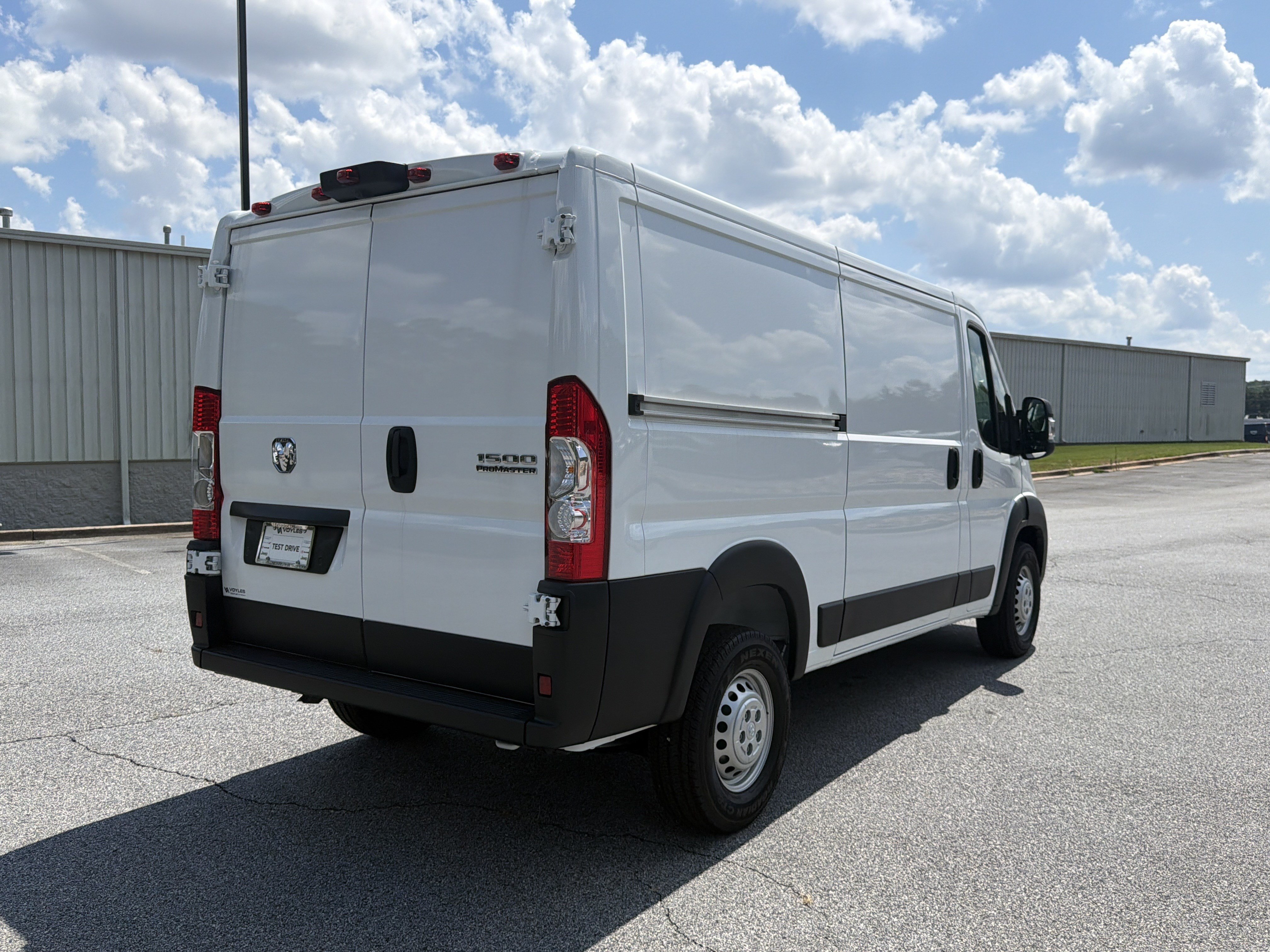 New 2026 Bright White Clearcoat RAM Low Roof image 8