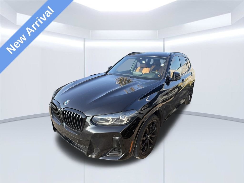 Used 2023 Black BMW sDrive30i image 1