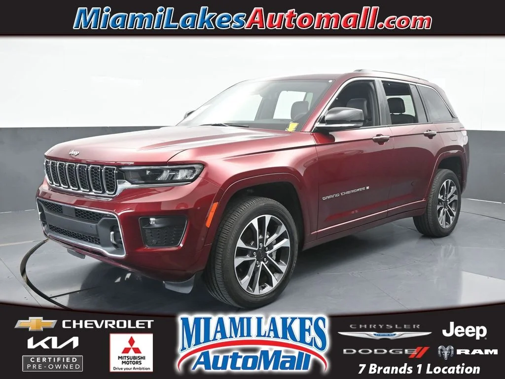 Used 2023 Velvet Red Pearlcoat Jeep Overland image 1