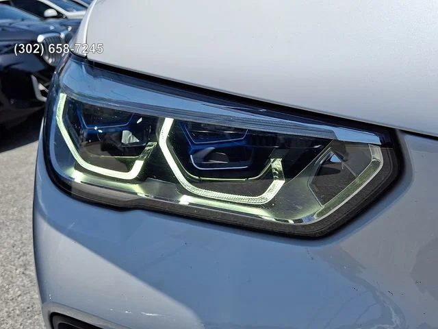 Certified Used 2023 Mineral White Metallic BMW xDrive45e image 9