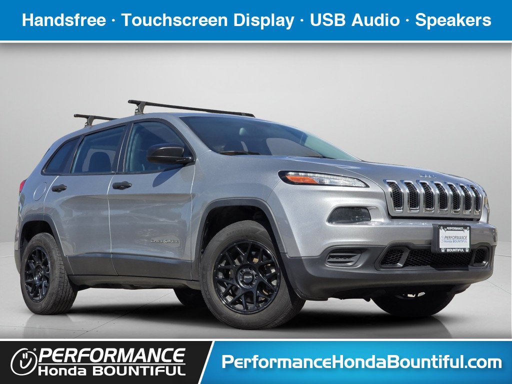 Used 2015 Billet Silver Metallic Clearcoat Jeep Sport image 1