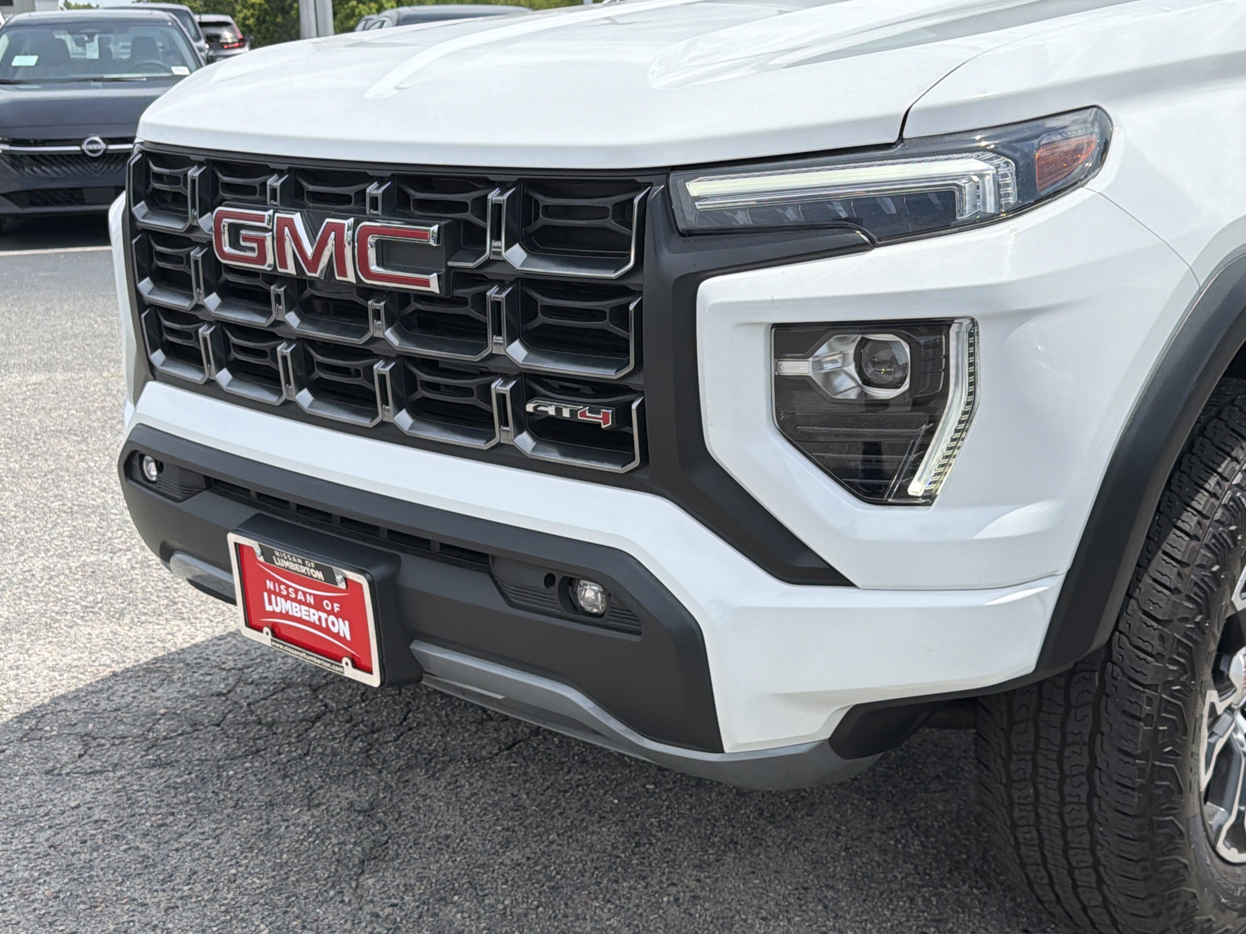 Used 2023 Summit White GMC 4WD AT4 image 34