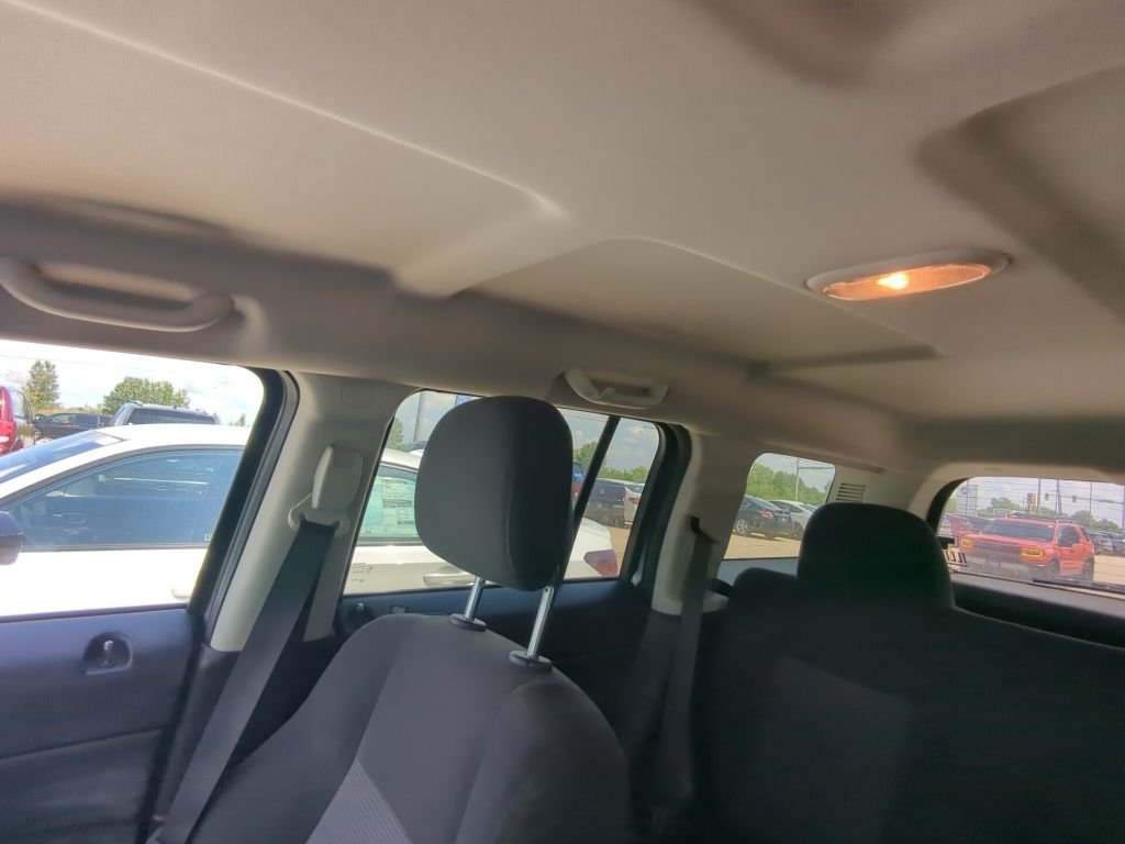 Used 2015 Billet Silver Metallic Clearcoat Jeep Sport image 8