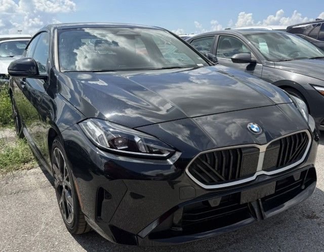 Used 2025 Black Sapphire Metallic BMW 228 xDrive Gran Coupe image 1