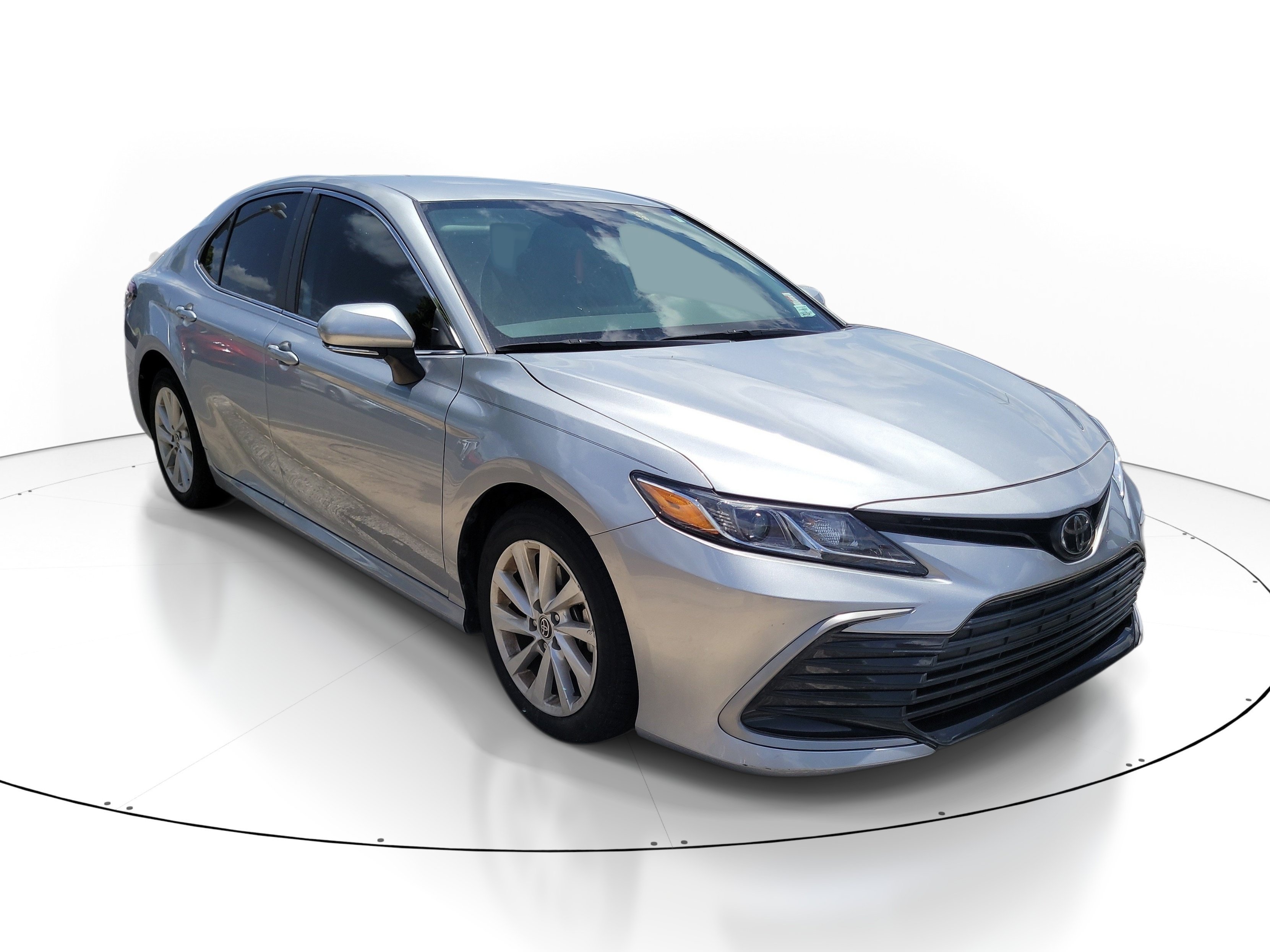 Used 2024 Celestial Silver Metallic Toyota LE image 1