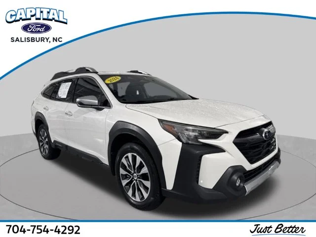 Used 2024 White Subaru Touring XT image 1