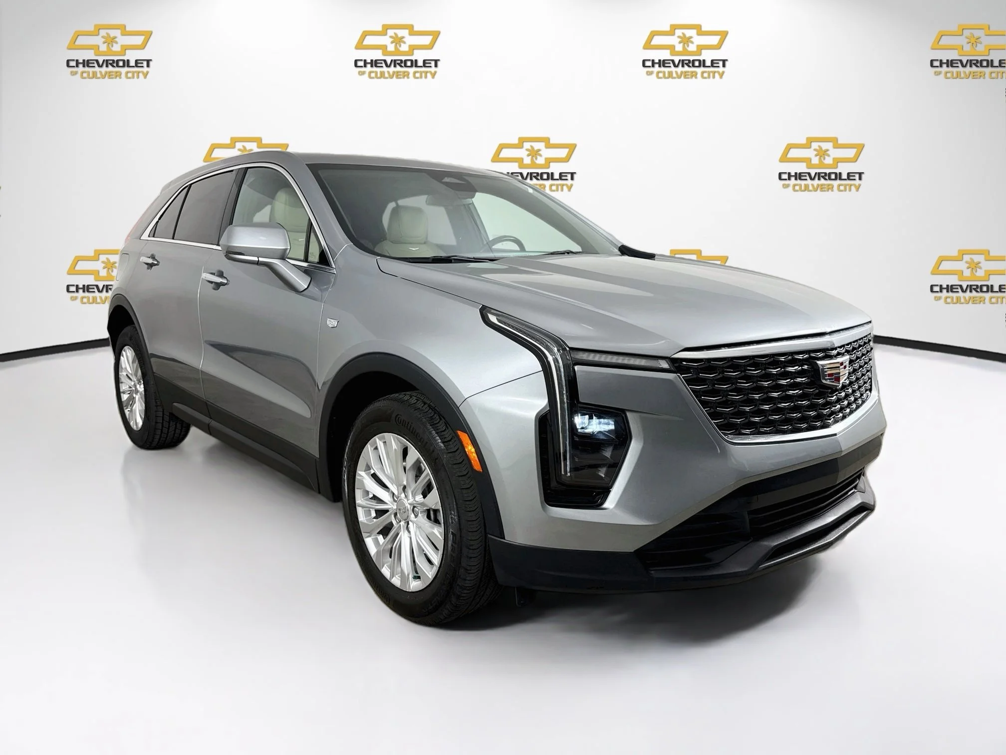 Used 2024 Argent Silver Metallic Cadillac Luxury image 1