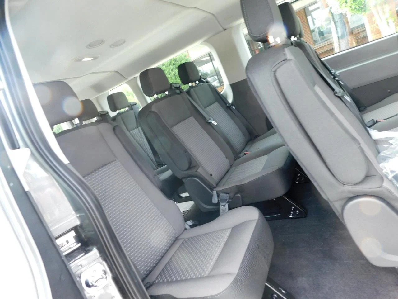 New 2026 Carbonized Gray Metallic Ford Passenger Van XLT image 13