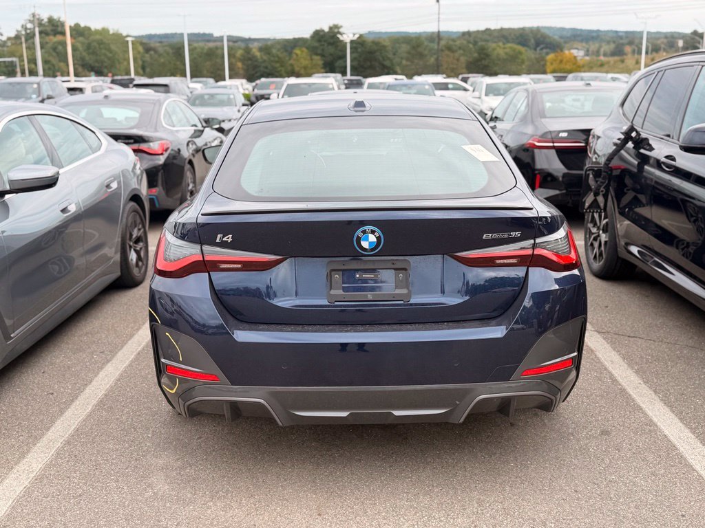 Used 2024 Tanzanite Blue II Metallic BMW eDrive35 image 4