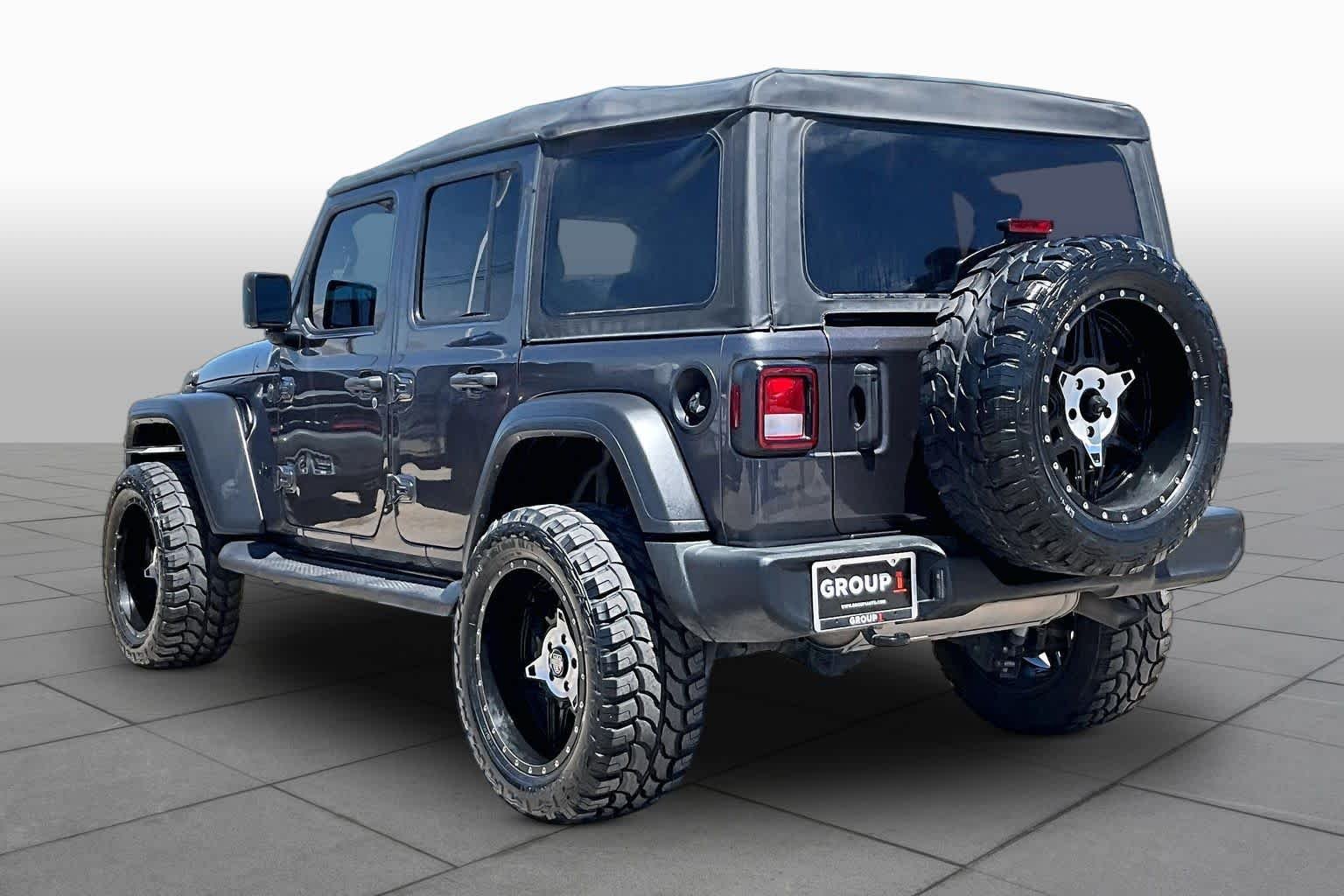 Used 2022 Granite Crystal Clearcoat Metallic Jeep Unlimited Sport S image 11