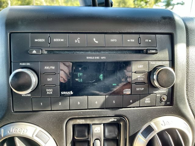 Used 2011 Silver Jeep Sahara image 13