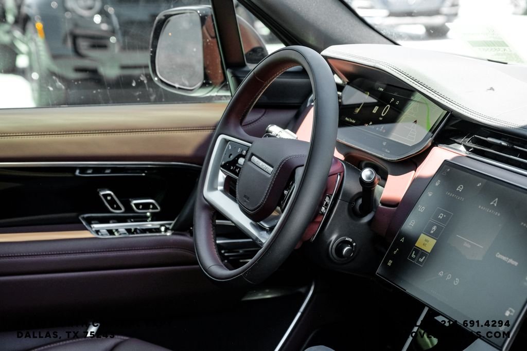 New 2026 Santorini Black Metallic Land Rover SE image 18