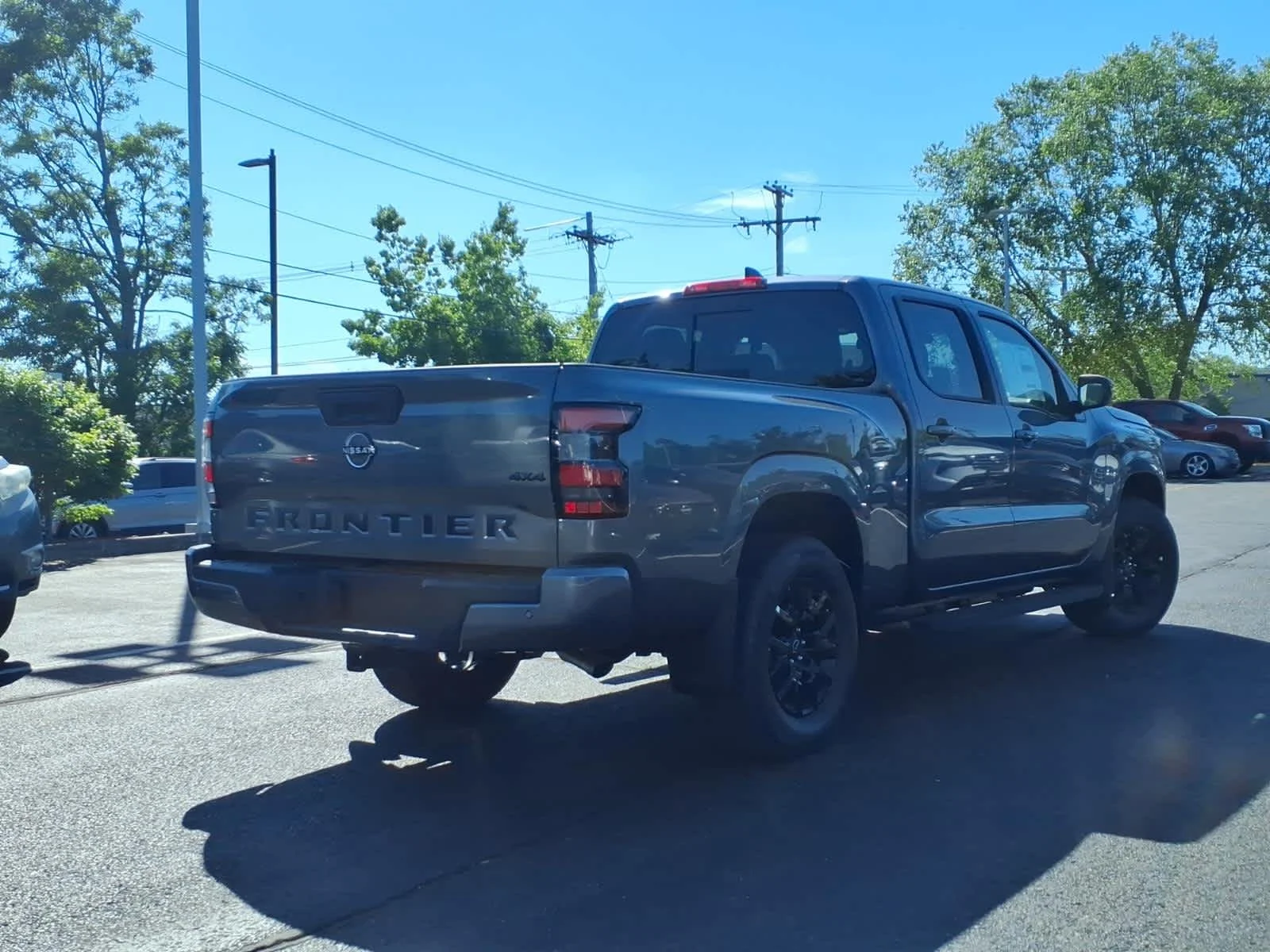New 2026 Gun Metallic Nissan SV image 3