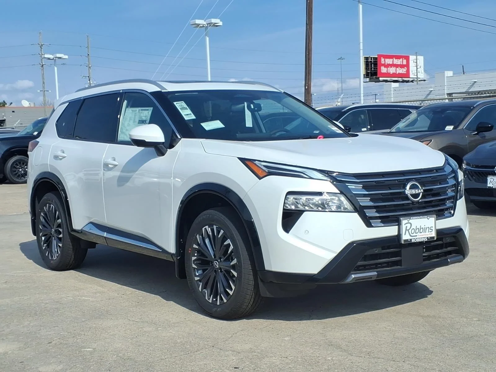 2026 Nissan Rogue Platinum White at Robbins Nissan