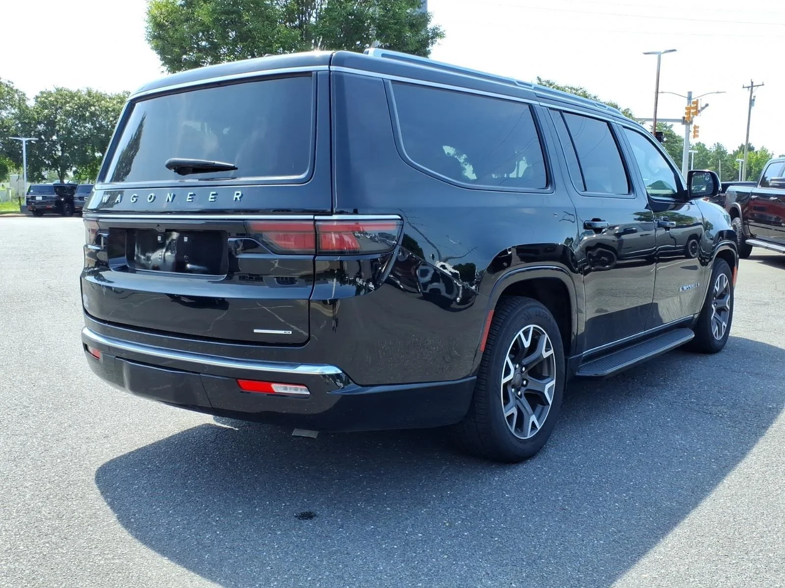 Used 2024 Diamond Black Crystal Pearlcoat Jeep Series III image 2