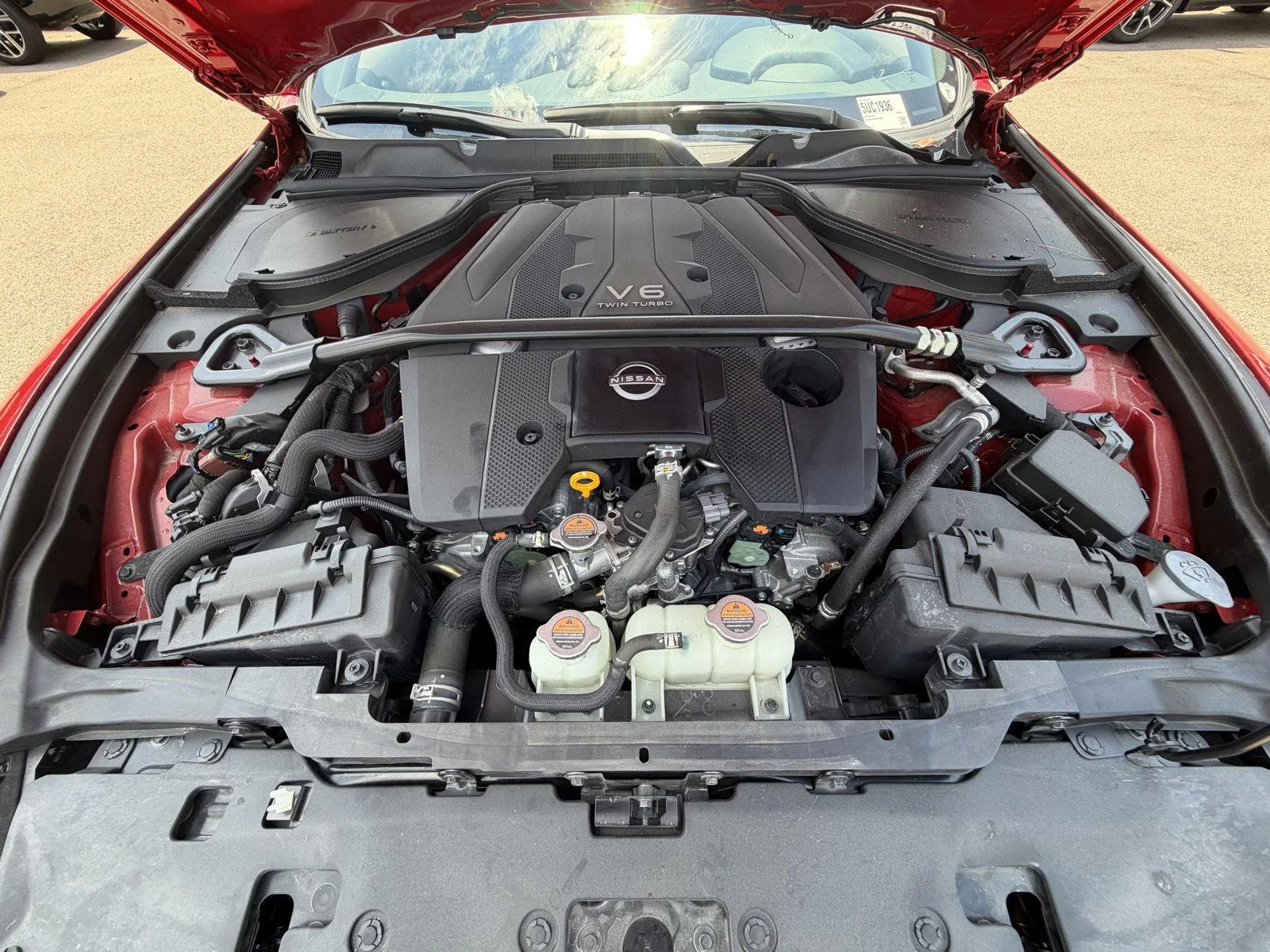 Used 2025 Solid Red/Super Black Nissan Performance image 19