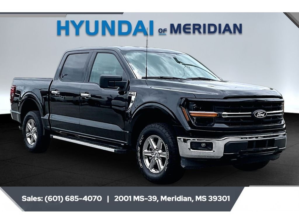 Used 2025 Agate Black Metallic Ford XLT image 1