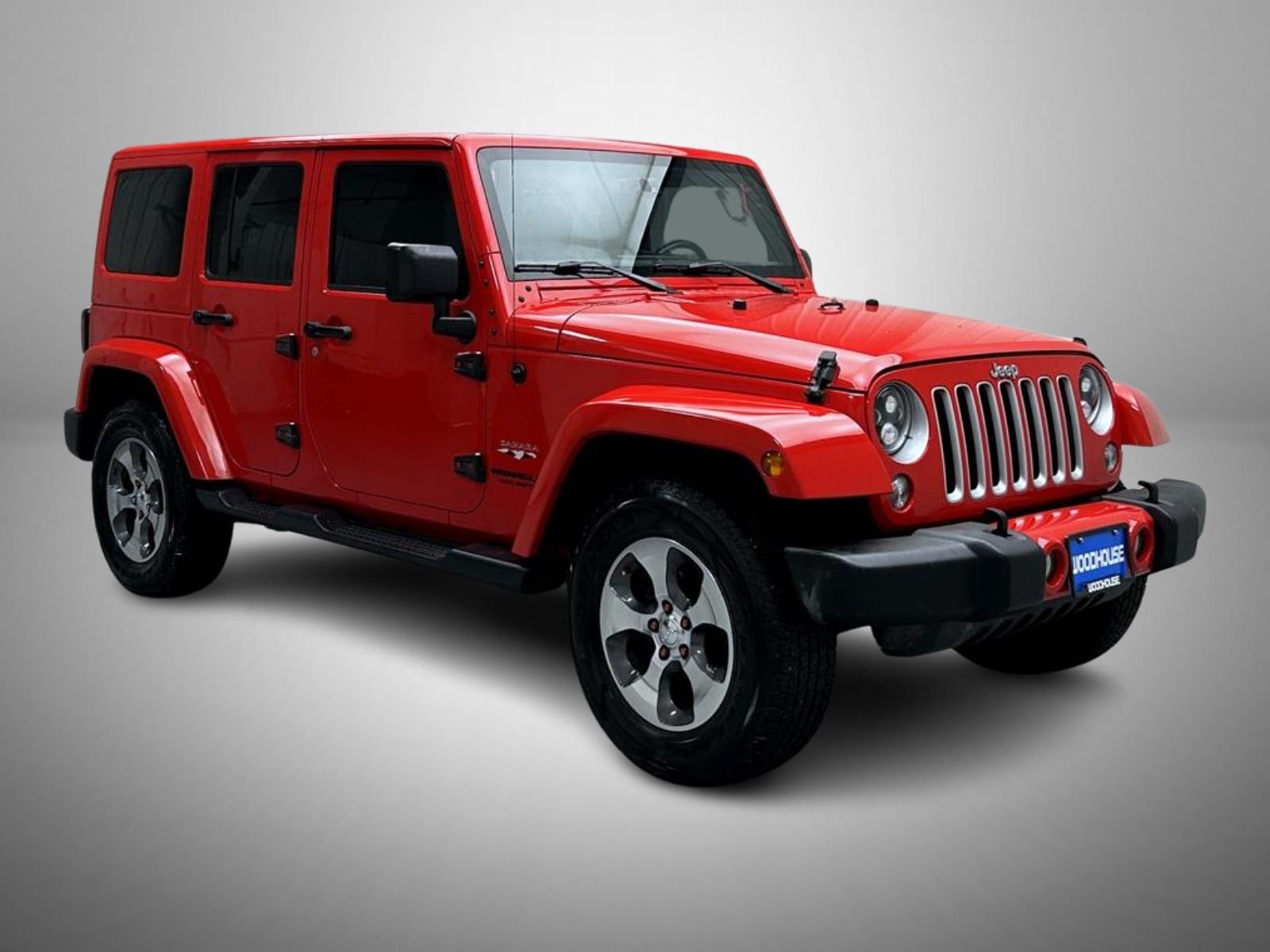 Used 2016 Red Jeep Unlimited Sahara image 3
