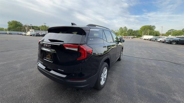 Used 2024 Ebony Twilight Metallic GMC SLE image 8