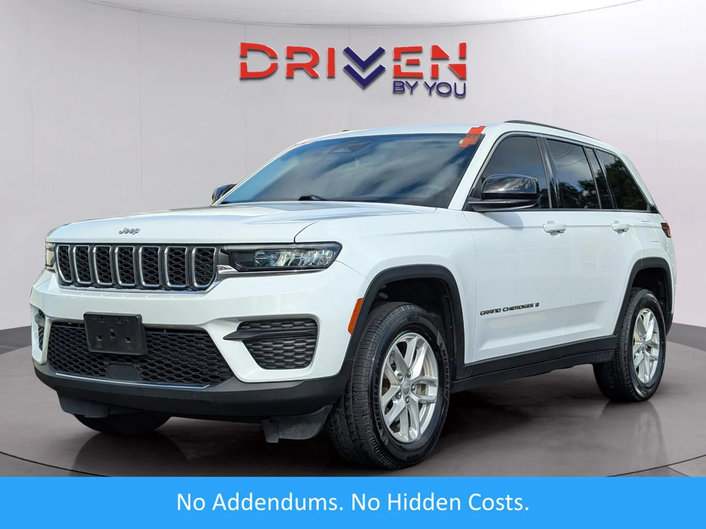 Used 2023 Bright White Clearcoat Jeep Laredo image 1