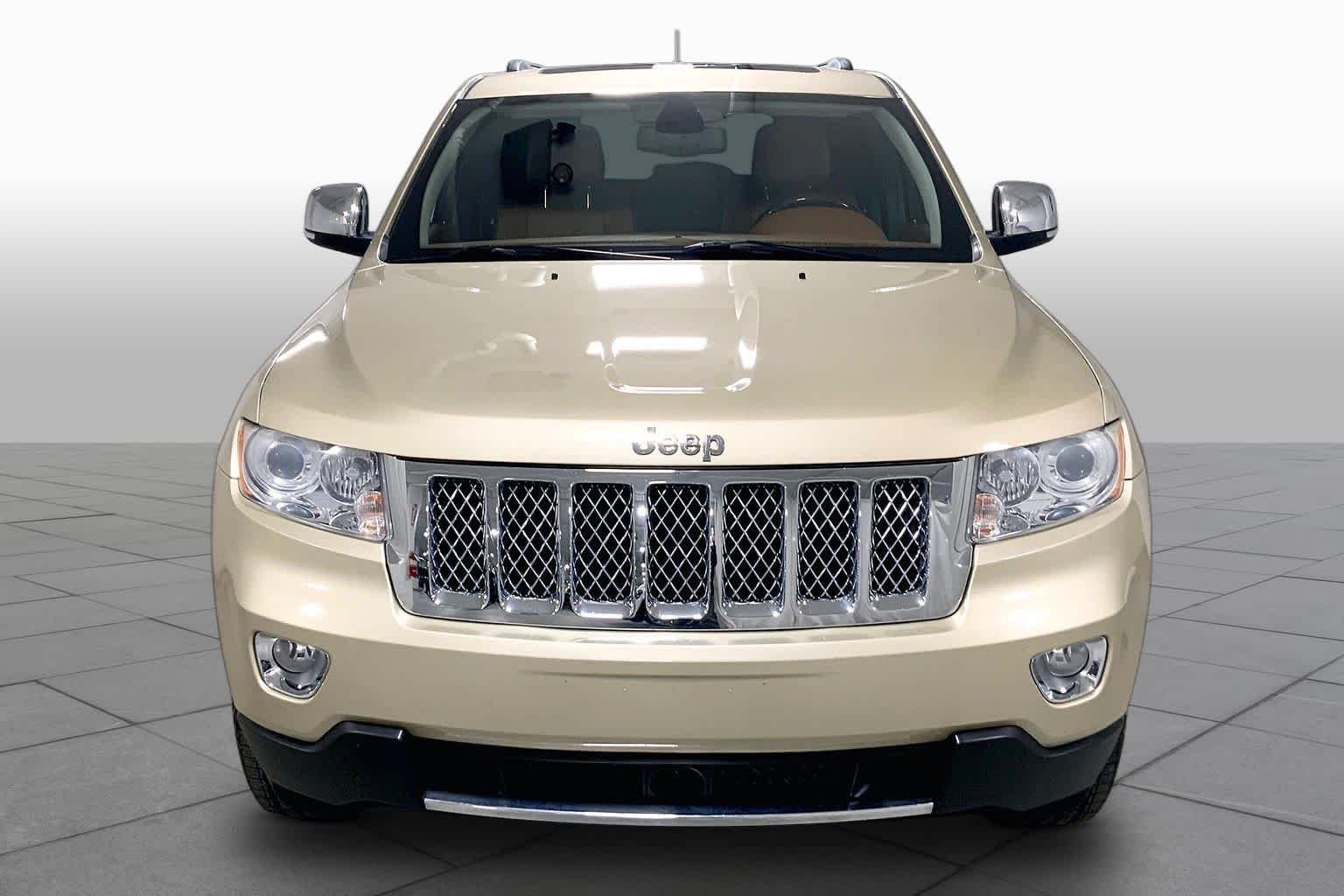 Used 2011 White Gold Jeep Overland Summit image 3