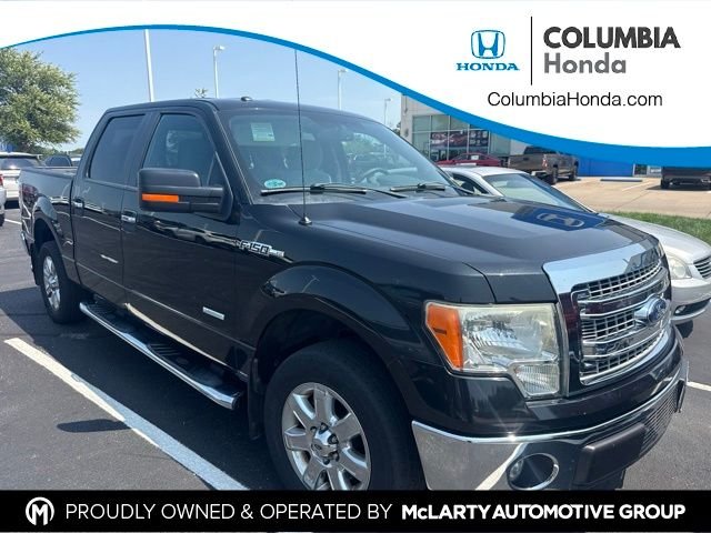 Used 2014 Black Ford Limited image 1