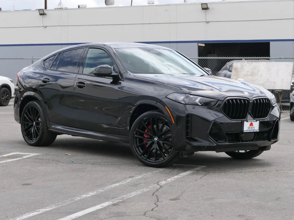 Used 2024 Black Sapphire Metallic BMW xDrive40i image 1