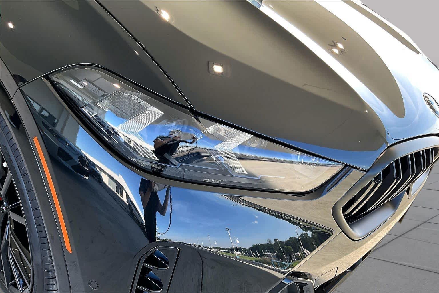 New 2027 Black Sapphire Metallic BMW M60i image 14