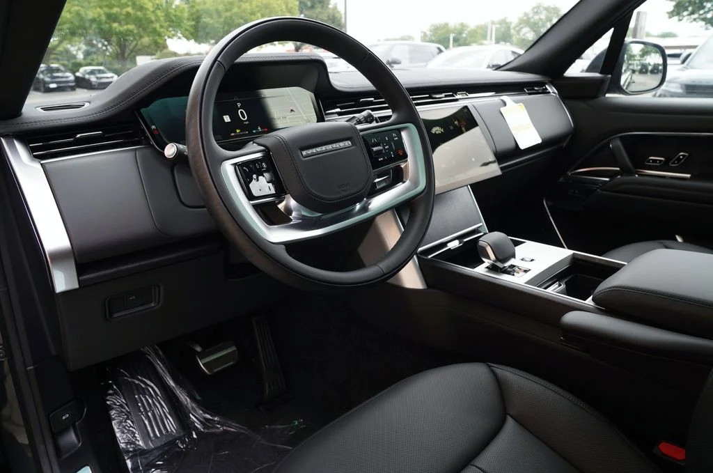 New 2026 Belgravia Green Land Rover SE image 14