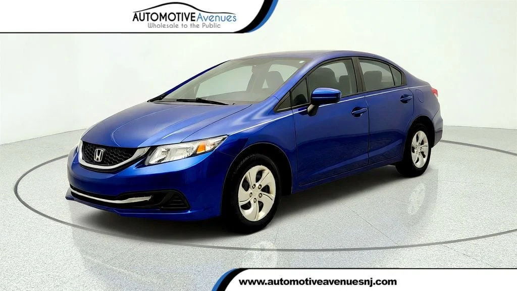Used 2015 Dyno Blue Pearl Honda 4dr CVT LX image 1