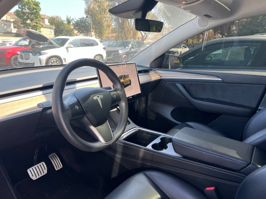 Used 2023 Solid Black Tesla Performance image 7