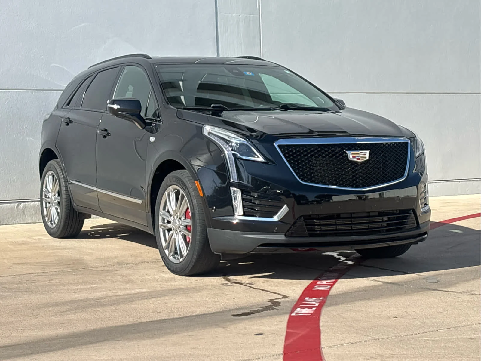 Used 2024 Stellar Black Metallic Cadillac Sport image 3