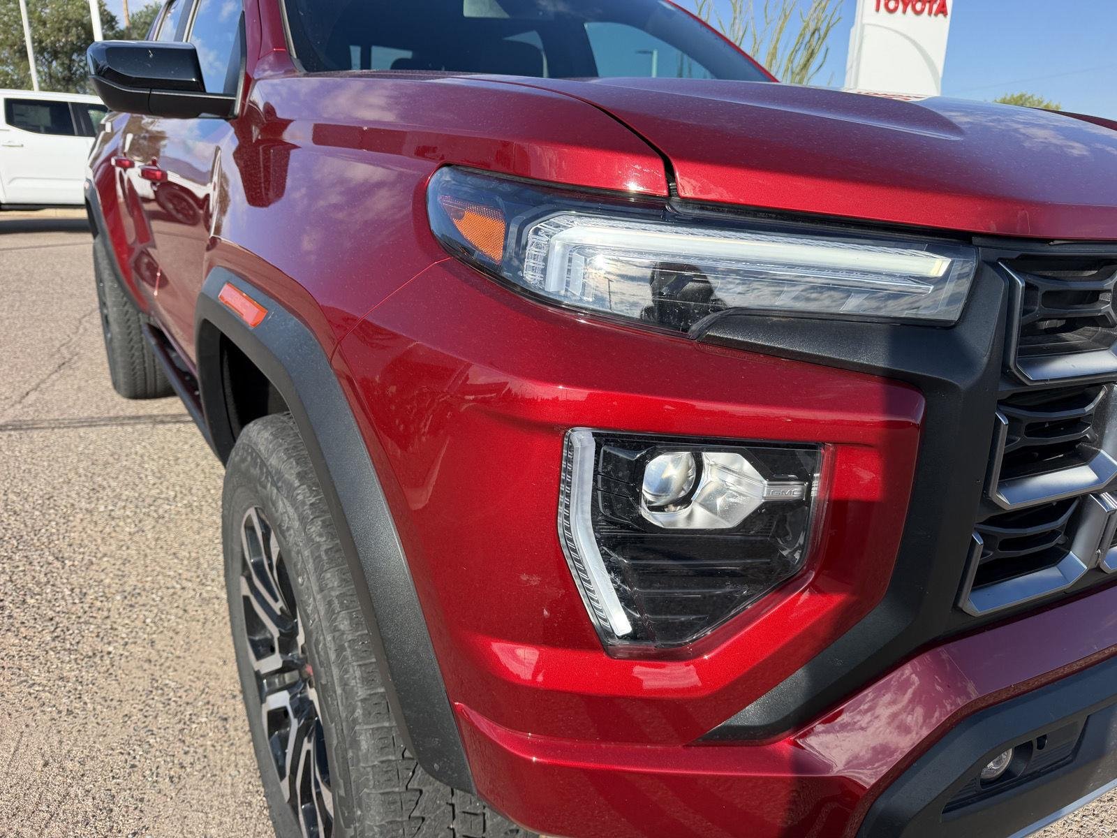Used 2025 Volcanic Red Tintcoat GMC 4WD AT4 image 14