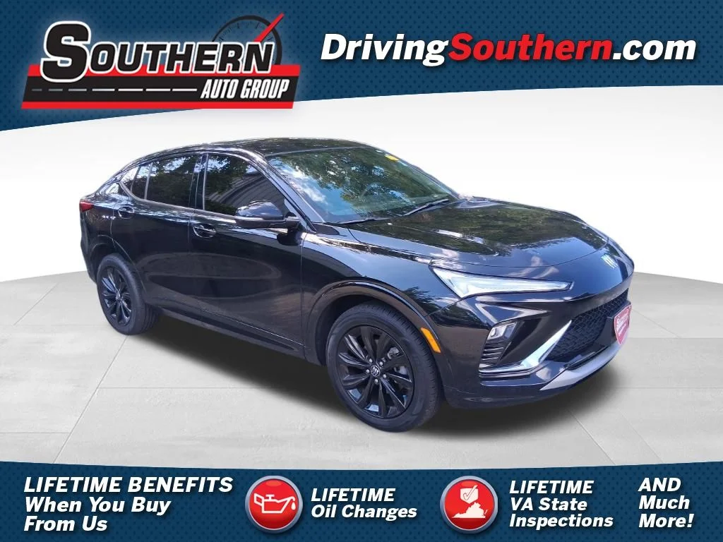 Used 2024 Black Buick Sport Touring image 1
