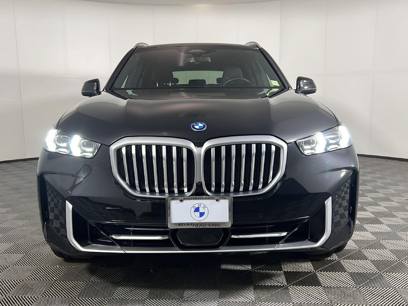 New 2026 Black Sapphire Metallic BMW xDrive50e image 7