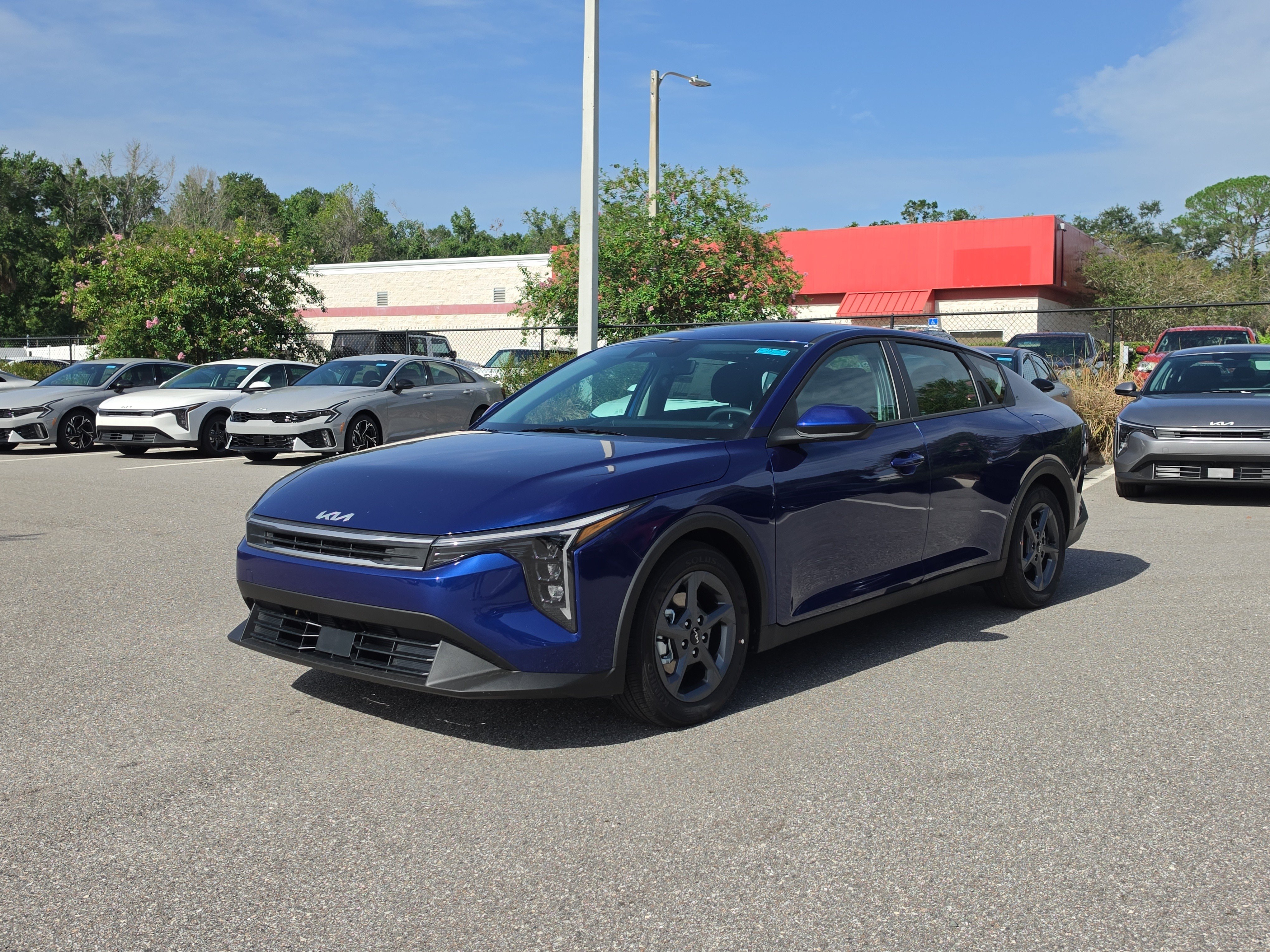 New 2026 Deep Sea Blue Kia LXS image 4