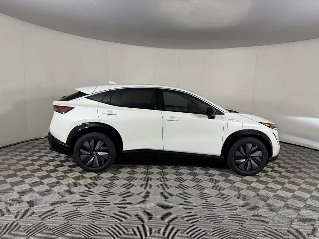 Used 2024 White Nissan EVOLVE+ image 12