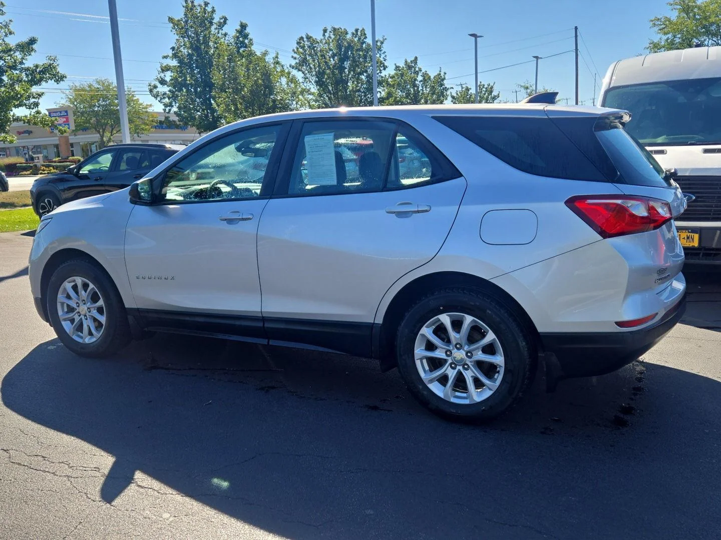 Used 2021 Silver Ice Metallic Chevrolet LS image 4
