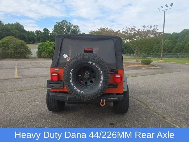 Used 2005 Impact Orange Cle Jeep Sport image 17