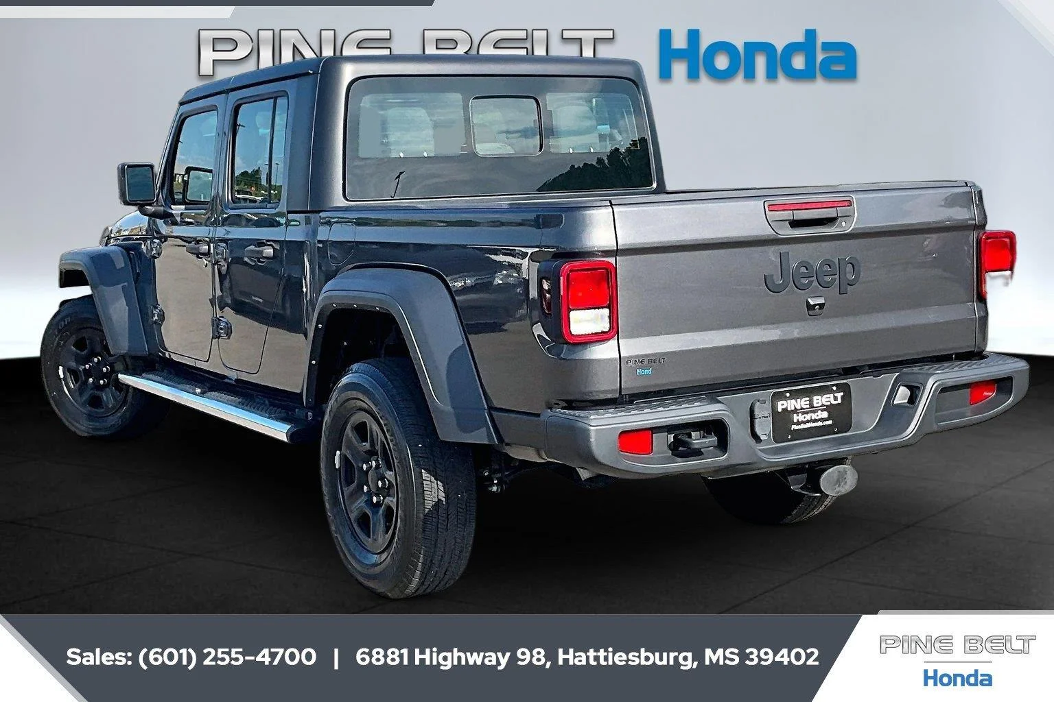 Used 2023 Granite Crystal Metallic Clearcoat Jeep Sport image 2