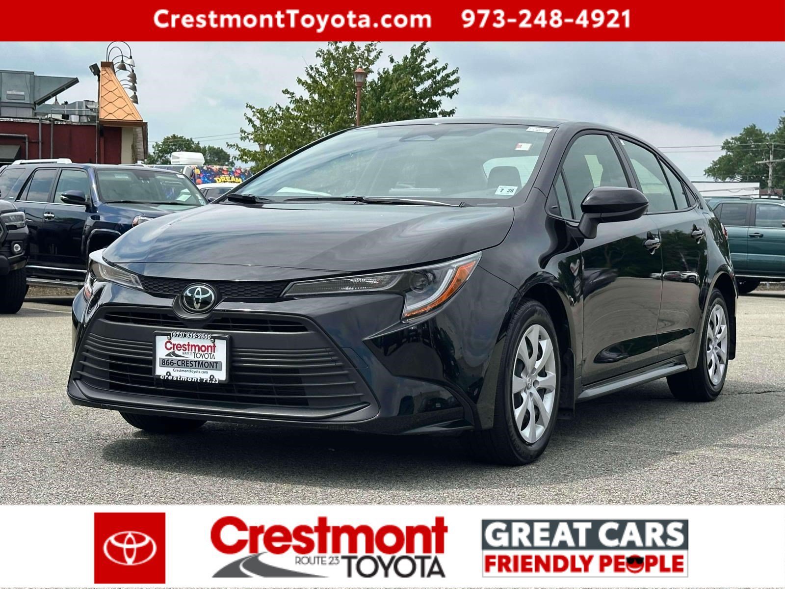 Certified Used 2023 Midnight Black Metallic Toyota LE image 1
