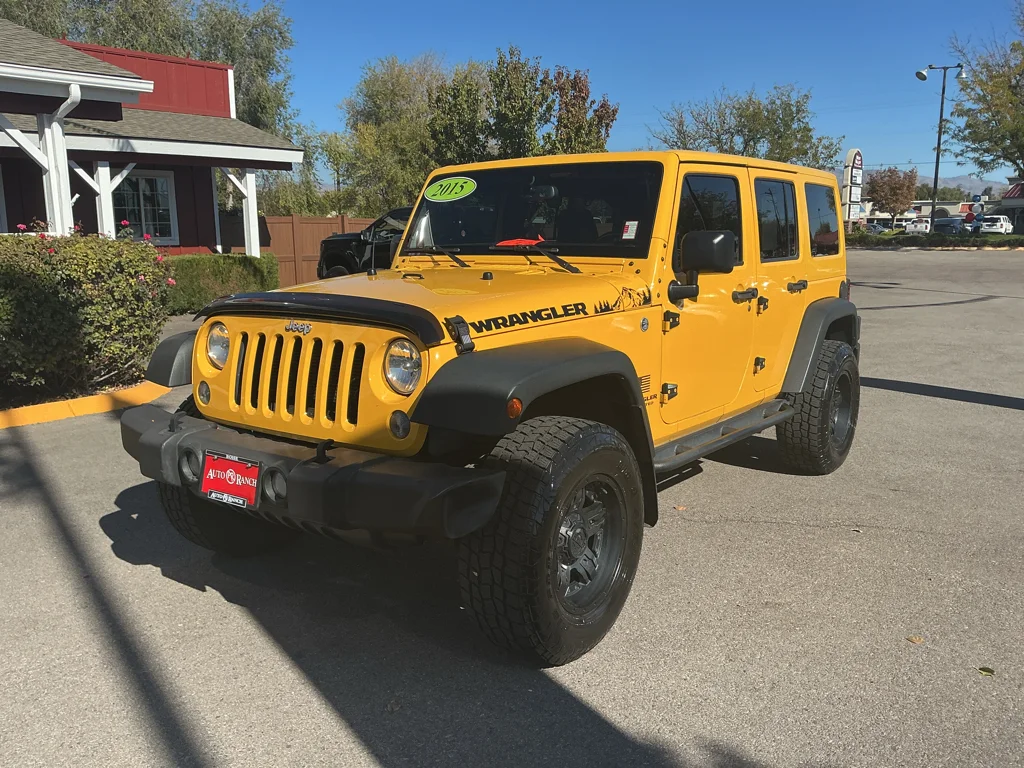 Used 2015 Baja Yellow Jeep Sport image 1